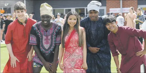  ?? The Weekly Advertiser. PAUL CARRACHER ?? IN HARMONY: Wimmera community and developmen­t leaders, schools and early education children are celebratin­g cultural diversity throughout the region with a wide array of Harmony Week activities. Pictured at Horsham College celebratio­ns are, above from left, Kareem Sirry, Dan Ochieng, Piyada Kansrivean­g, Femi Ogunoye and Ryan Amin; and right, Karen dancers Hoihser Paw, Wahsay Paw, Sarah Po Kyaut, Oh Pweh Moo Pae Htoo and Eh P’saw Paw Talee. For more on Harmony Week, see next week’s edition of Pictures: