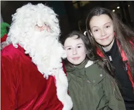  ??  ?? Santa with Ava McKeever and Mila Shortt.