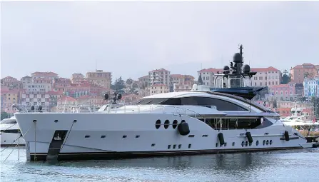  ?? AP-Yonhap ?? The yacht “Lady M,” owned by Russian oligarch Alexei Mordashov, is seen at it is docked at Imperia’s harbor, Italy, Saturday.