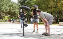  ??  ?? Artistic director StantonWel­ch, right, checks a shot during filming with Rivera and lighting designer Lisa J. Pinkham.