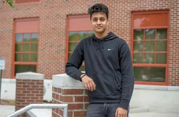  ?? Pam Panchak/Post-Gazette ?? Samir Kadariya, a senior at Brentwood High School and one of only 300 students nationwide to receive a Gates Foundation Scholarshi­p, graduates on Friday.