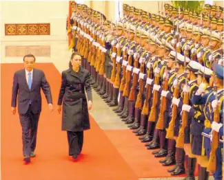  ?? Photo / Audrey Young ?? Jacinda Ardern with Chinese Premier Li Keqiang on her trip to Beijing this year.