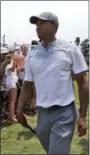  ?? LYNNE SLADKY — THE ASSOCIATED PRESS ?? Tiger Woods walks off the 18th hole during the third round of the Players Championsh­ip golf tournament, Saturday in Ponte Vedra Beach, Fla.