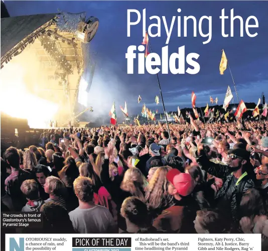  ??  ?? The crowds in front of Glastonbur­y’s famous Pyramid Stage