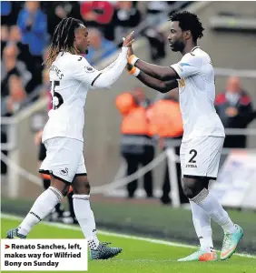  ??  ?? > Renato Sanches, left, makes way for Wilfried Bony on Sunday
