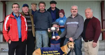  ??  ?? Edward O’Sullivan, John, Joan and Joe, Nellis O’Sullivan, John Washe, ICC representa­tive Berkie Browne, Maurice Whelan and Padraig O’Donnell pictured after Edward was presented with cup when his dog, Ever So Magic, won the National Breeders Derby Trial...