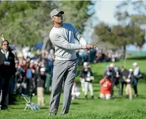  ?? JEFF GROSS/GETTY IMAGES ?? Former world No 1 Tiger Woods spent much of his two days trying to save par from the rough.