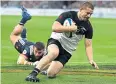  ??  ?? Leading man: Dane Coles scores the opening try of the All Blacks’ win in Paris