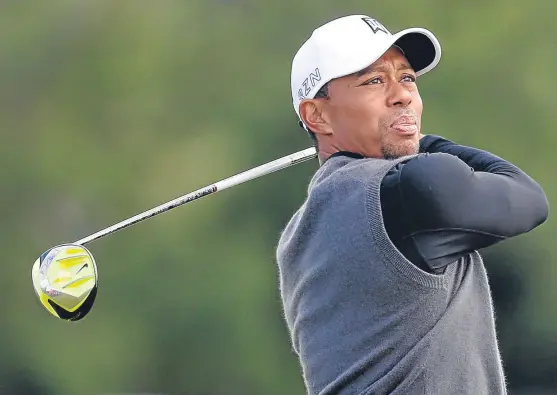  ?? Picture: PA. ?? Tiger Woods is out for another six months following a fourth back surgery.