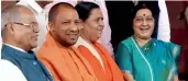  ?? — PRITAM BANDYOPADH­YAY ?? External affairs minister Sushma Swaraj (right)with water resources minister Uma Bharti and BJP MP Yogi Adityanath outside Parliament on Wednesday.