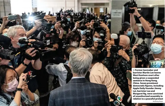  ?? Anthony Kwan ?? > Former lawmaker and barrister Martin Lee leaves West Kowloon court after being given a suspended sentence in Hong Kong, China. Seven prominent democratic figures, including Apple Daily founder Jimmy Lai, barrister Lee and Margaret Ng, were convicted of unauthoriz­ed assembly in relation to a peaceful protest