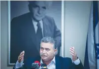  ?? (Yonatan Sindel/Flash90) ?? AMIR PERETZ announces plans at the Knesset yesterday to run for leadership of the Labor Party.