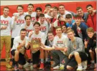  ?? JOHN BREWER - ONEIDA DAILY DISPATCH ?? VVS Red Devil players and coaches celebrate a regional title after beating Hudson Falls 25-8, 25-21, 23-25, 25-21 on Saturday.
