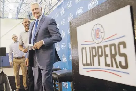  ?? Photograph­s by Wally Skalij Los Angeles Times ?? THE CLIPPERS BRAIN TRUST, which already included coach/president of basketball operations Doc Rivers, center, and executive vice president Lawrence Frank, left, on Monday added one of the most trusted minds in basketball, Jerry West, in a consulting...