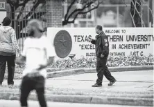  ?? Brett Coomer / Staff photograph­er ?? A guard works at Texas Southern after the campus was evacuated because of a bomb threat. Later Wednesday, Grambling University in Louisiana also received a threat.