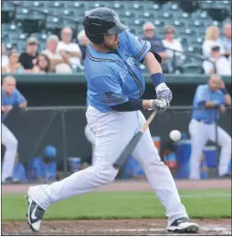  ?? PHOTO BY BERT HINDMAN ?? Blue Crabs catcher Ryan Wiggins delivered with his second grand slam of the season in Sunday’s 6-1 victory over the Somerset Patriots in a rubber match of a three-game series to help spur a five run fourth inning at TD Bank Ballpark in New Jersey.