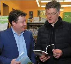  ?? Photo by Declan Malone. ?? Tony Bergin and Dr Conor Brosnan in Dingle Library for the launch of the Kerry Archaeolog­ical and Historical Society Journal last week.