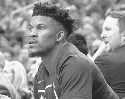  ?? ERIC CHRISTIAN SMITH/AP ?? Heat trade target Jimmy Butler addressed Wednesday why he remains at odds with the Timberwolv­es.