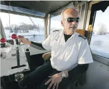  ?? NICK BRANCACCIO ?? Steve Getty, captain of the Ste. Claire V, says extreme temperatur­es have made crossing the Detroit River challengin­g.