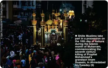  ?? ?? Shiite Muslims take part in a procession on the 10th day of Ashura during the Islamic month of Muharram, commemorat­ing the seventh century killing of Prophet Mohammed’s grandson Imam Hussein, in Ahmedabad on Tuesday (9)