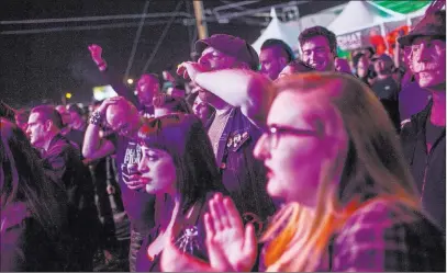  ??  ?? Kevin Brooks of Las Vegas, 32, cheers during the show celebratin­g dive bar Double Down Saloon’s 25th anniversar­y.