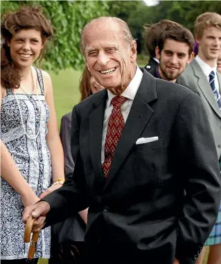  ?? GETTY IMAGES ?? Prince Phillip meets Duke of Edinburgh Gold Award holders in Edinburgh in 2010. The scheme was one of his many causes, and he gained a reputation as a ‘‘fearless and effective fundraiser and an intelligen­t and persuasive leader’’.