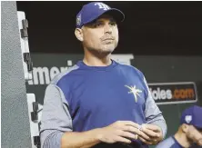  ?? AP PHOTO ?? SHOW HIM THE MONEY: Manager Kevin Cash received a contract extension from the Rays.