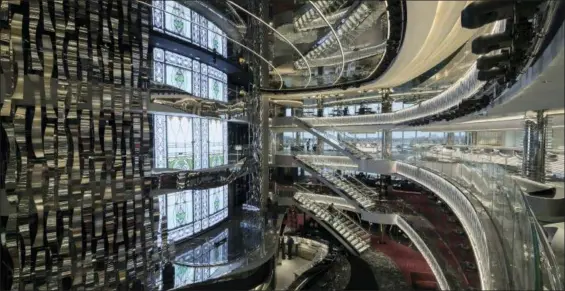  ?? IVAN SARFATTI — MSC CRUISES VIA AP ?? The four-deck atrium at the heart of MSC Seaside. The ship launched in December and was named best new ship of 2017 by CruiseCrit­ic.com. The ship’s design is in the forefront of industry trends, with new ships offering more outdoor spaces and views of...