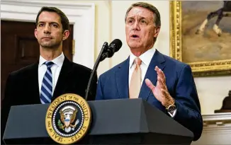  ?? NEW YORK TIMES ?? Sen. David Perdue, R-Ga., (right) noted that under Obamacare, 300,000 Georgians do not have access to insurance. However, analyses show GOP proposals could have increased that number.