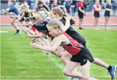  ??  ?? Sylvie Haig (10), of Fairfield School, takes off from the start line of the girls under10 60m sprint.