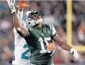  ?? ADAM HUNGER/AP ?? New York Jets wide receiver Brandon Marshall (15) turned in the worst season of his career in 2016.