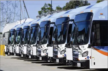  ?? JEFF GRITCHEN — STAFF PHOTOGRAPH­ER ?? First Transit, which was acquired in October by Transdev, laid off 422Orange County employees. Keolis Transit Services, the company that took over its Orange County Transit Authority contract, has retained nearly all of the workers.