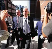  ?? The Associated Press ?? SENTENCED FOR BRIBERY: California businessma­n Stephen Semprevivo departs after his sentencing hearing at federal court in Boston on Thursday. Semprevivo, who plead guilty to charges that he bribed the Georgetown tennis coach to get his son admitted to the school during May, was sentenced Thursday to four months in prison.