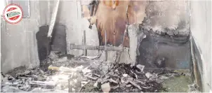  ??  ?? آثار الحريق كما بدت أمس من داخل الغرفة 216 في مستشفى الملك فيصل بالطائف.