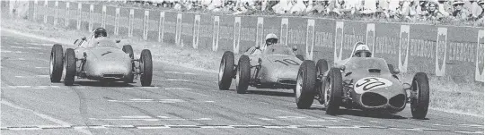  ??  ?? Facing page In the 1961 Monaco GP, Gurney (pictured being chased by Phil Hill’s Ferrari), finished fifth, two laps behind winner, Stirling Moss
Below Reims tradition for slipstream­ing duels is spectacula­rly upheld in July 1961 in the battle between eventual winner, Giancarlo Baghetti, in a Ferrari and Gurney’s Porsche (12), with occasional interventi­on from Jo Bonnier (10)