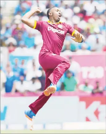  ??  ?? All-rounder Dwayne Bravo exults after claiming a wicket during India’s innings in the opening Twenty20 Internatio­nal yesterday. (Photo courtesy WICB Media)