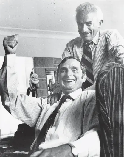  ?? Auckland Star ?? journalist Pat Booth, right, and Arthur Allan Thomas celebrate Thomas’ prison release.