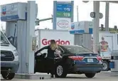  ?? SENTINEL SUSAN STOCKER/SOUTH FLORIDA SUN ?? Regular gas at $4.59 per gallon is displayed at a Chevron station at 645 W. Boynton Beach Blvd. on April 12. Due to high gas prices, some people are not driving as much as they used to.