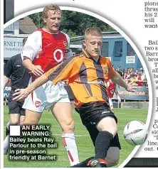  ??  ?? AN EARLY WARNING: Bailey beats Ray Parlour to the ball in pre-season friendly at Barnet