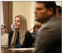  ?? (Arkansas Democrat-Gazette/Stephen Swofford) ?? Melissa Harris (left) speaks in favor of Senate Bill 377, which would regulate paid petition blockers, during a meeting of the Senate Committee on Judiciary at the state Capitol in Little Rock on Wednesday. Harris described her time as a paid canvasser when she was harassed and threatened by petition blockers.