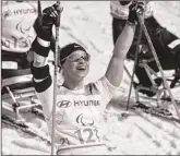  ??  ?? Oksana Masters celebrates her victory after crossing the finish line in Pyeongchan­g on Wednesday.