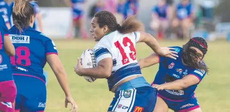  ?? Picture: Kevin Farmer ?? HARD RUN: Donna Naulu takes the ball up for Brothers during their Dan O’Neill Shield clash with Newtown at Jack Martin Centre.