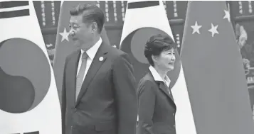  ?? POOL PHOTO BY HOW HWEE YOUNG ?? South Korean President Park Geun Hye and Chinese President Xi Jinping on the sideline of the G- 20 Summit in September. South Korea’s trade with China is causing over- dependence worries.