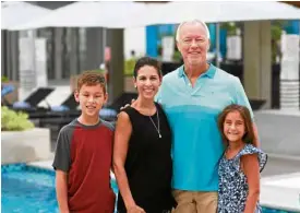  ??  ?? Roy and Carrie Meyer with Cody and Samantha at the poolside