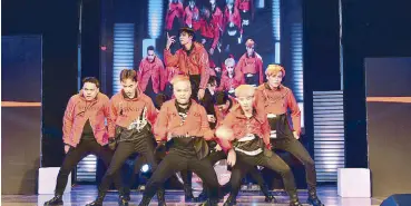  ??  ?? EXOTIX, the 2016 Pinoy K-Pop Star grand winner in performanc­e category, showing off K-Pop moves in a cover of EXO’s Monster