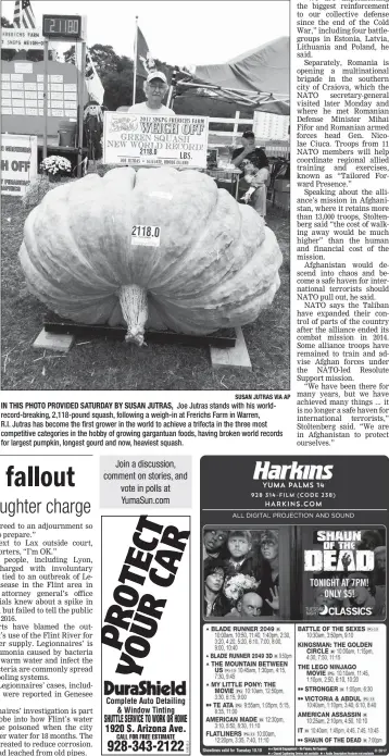  ?? SUSAN JUTRAS VIA AP ?? IN THIS PHOTO PROVIDED SATURDAY BY SUSAN JUTRAS, Joe Jutras stands with his worldrecor­d-breaking, 2,118-pound squash, following a weigh-in at Frerichs Farm in Warren, R.I. Jutras has become the first grower in the world to achieve a trifecta in the...