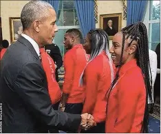  ??  ?? Brianna Rollins being congratula­ted by former US President, Barack Obama on her return from the Olympic Games