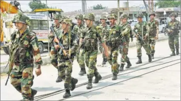  ?? HT ?? Army personnel conducting a flag march in Sirsa on Saturday. The army also took control of an old dera of the Sacha Sauda sect.