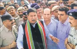  ??  ?? BJP MP Raj Kumar Saini being stopped by police from entering Mokhra village, where he was invited as a chief guest at an event organised by a backward community, on Monday. MANOJ DHAKA/HT