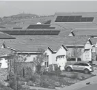  ?? ?? California’s successful 26-year-old program to get more people to put solar panels on their homes has been at the center of a fierce debate.